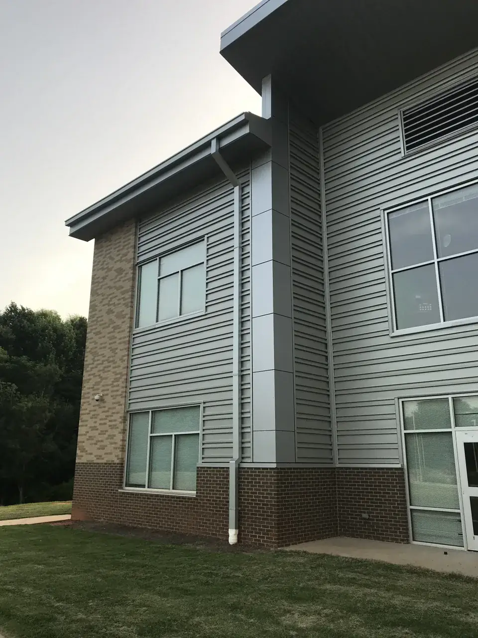 Exterior eaves and roof gutter at the edge of a building